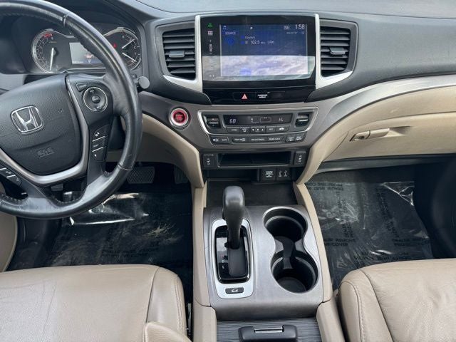 Used 2016 Honda Pilot EX-L with VIN 5FNYF6H5XGB055104 for sale in Rochester, Minnesota